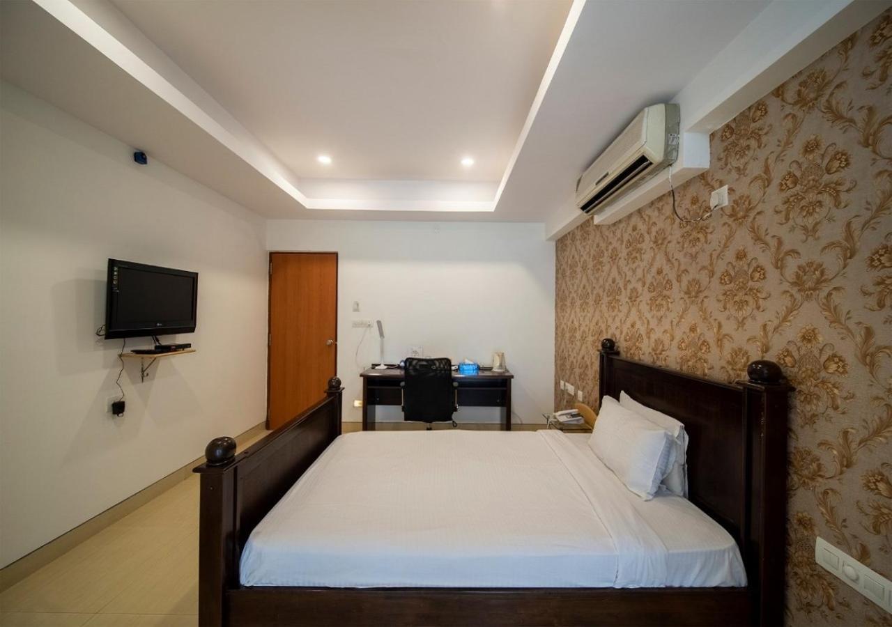 Capital O 46966 Apollo 27 Hotel Bangalore Luaran gambar